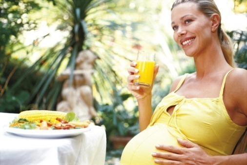 Pregnant woman with health food